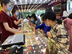 Bản tin thị trường vàng sáng 15/3: Vàng trong nước đi ngang, thế giới sụt giảm